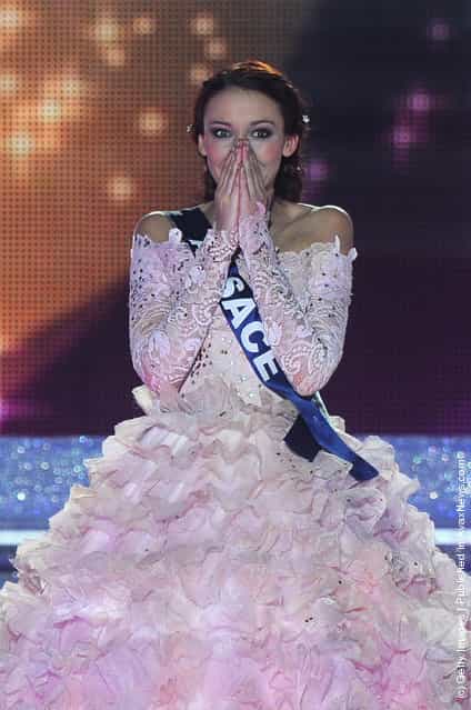 Delphine Wespiser reacts as she celebrates being crowned Miss France 2012 on stage