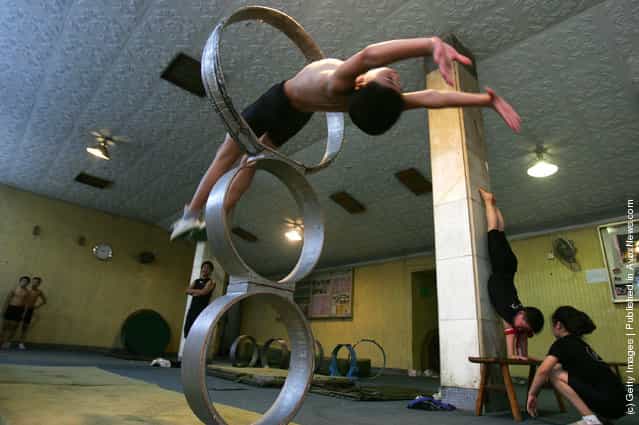 Students practice acrobatic skills in the Sichuan Provincial Art School in Chengdu of Sichuan Province, China