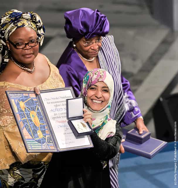 (L-R) Leymah Gbowee of Liberia, Ellen Johnson Sirleaf President of Liberia and Tawakkol Karman of Yemeni, joint winners of the Nobel Peace Prize, pose during the Nobel Peace Prize Award ceremony at Oslo City Hall