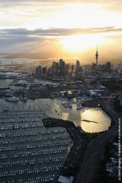 The sun rises over Auckland City during the TelstraClear Challenge in Auckland, New Zealand