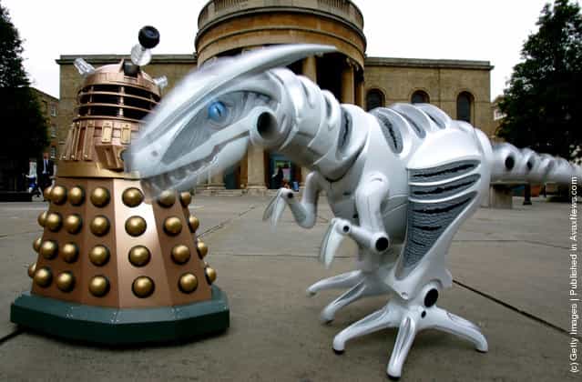 Remote controlled Dalek and Roboraptor toys are displayed at the Dream Toys 2005 Pre-Christmas Expo