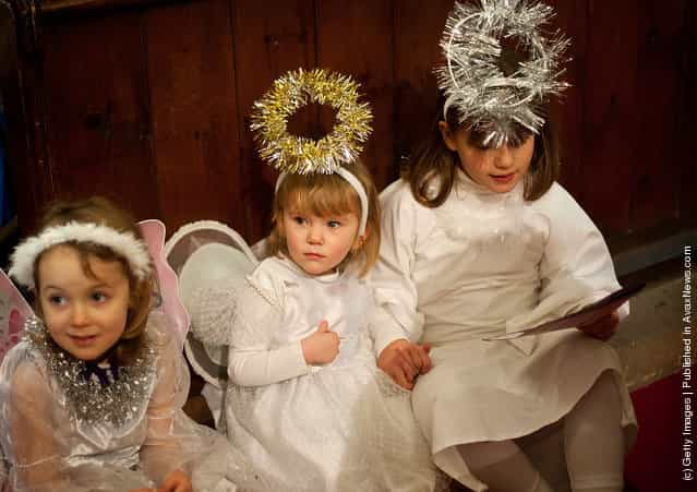 Children perform during a traditional Christmas Nativity