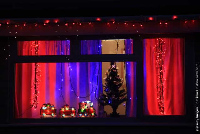 Christmas lights are seen in a house in Melksham, England