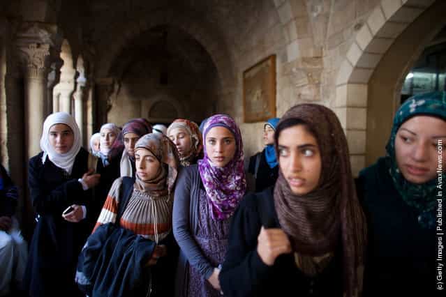 Palestinian Muslim schoolgirls visit the Church of the Nativity in Bethlehem