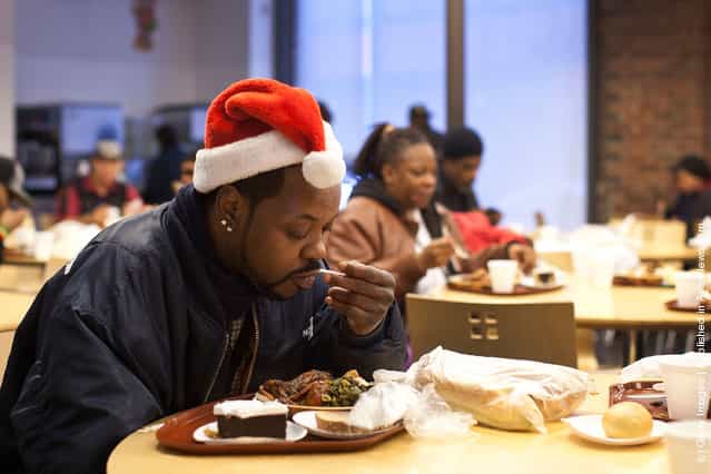 Harry Sprinkle eats a meal at St. John's Bread and Life, a free meal service in the Brooklyn borough of New York City
