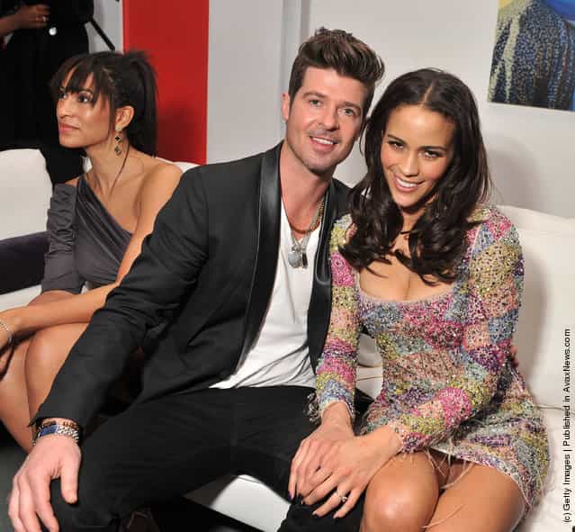 Singer Robin Thicke and actress Paula Patton attend the Mission: Impossible - Ghost Protocol U.S. premiere