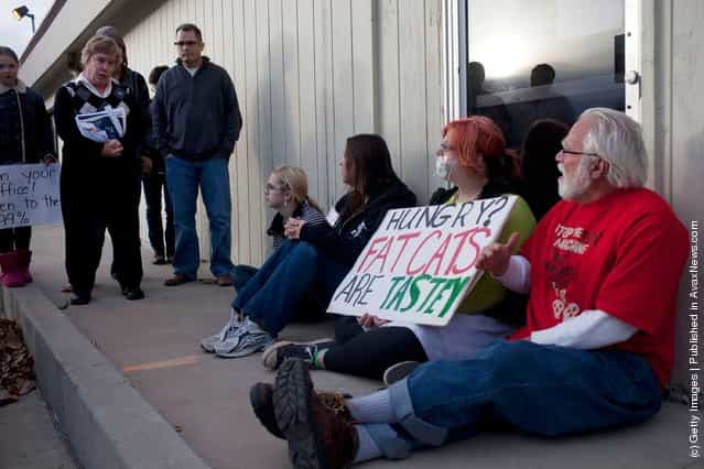 Occupy Iowa Caucus Movement Protests At Obama Iowa Campaign HQ