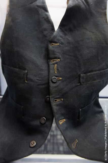Passenger William Henry Allens wool black vest is seen among artifacts recovered from the RMS Titanic