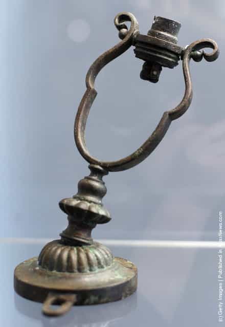 A Gimbal lamp is seen among artifacts recovered from the RMS Titanic