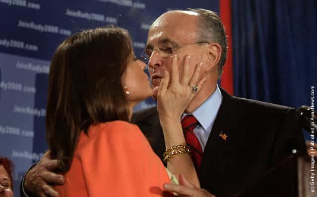 Republican presidential hopeful former New York City mayor Rudy Giuliani kisses his wife Judith Giuliani
