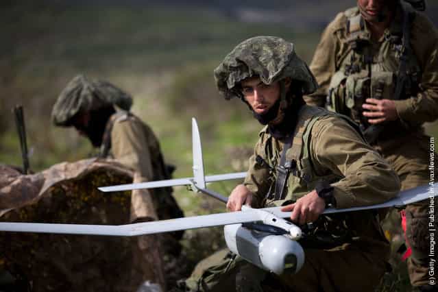 Israeli soldiers get ready to launch the Skylark drone