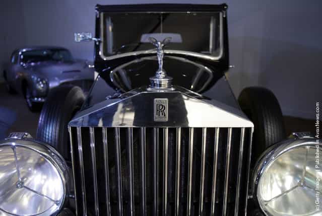 A Rolls-Royce Phantom III that was used in the James Bond film Goldfinger is displayed at the Bond In Motion exhibition