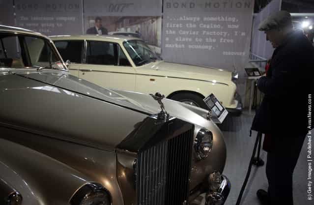 A musuem visitor looks at a Rolls-Royce Silver Cloud II that was used in the James Bond film A View To A Kill and is currently being displayed at the Bond In Motion exhibition
