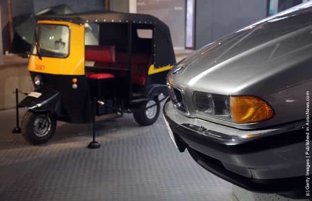A BMW750iL that was used in the 1997 James Bond film Tomorrow Never Dies and a Tuk-Tuk taxi that was used in Octopussy and are currently being displayed at the Bond In Motion exhibition