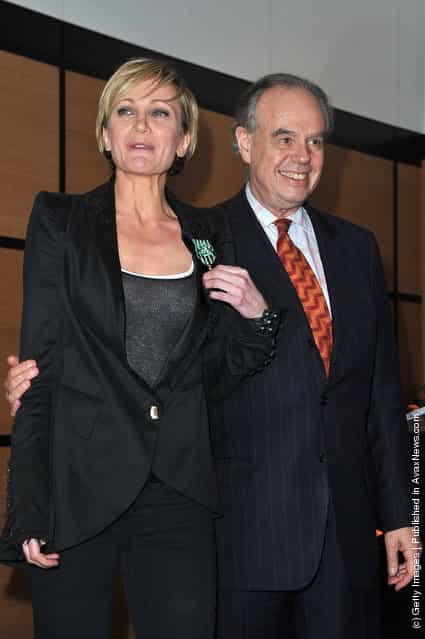 Patricia Kaas poses with French culture Minister, Frederic Mitterrand after being honored at Hotel Majestic