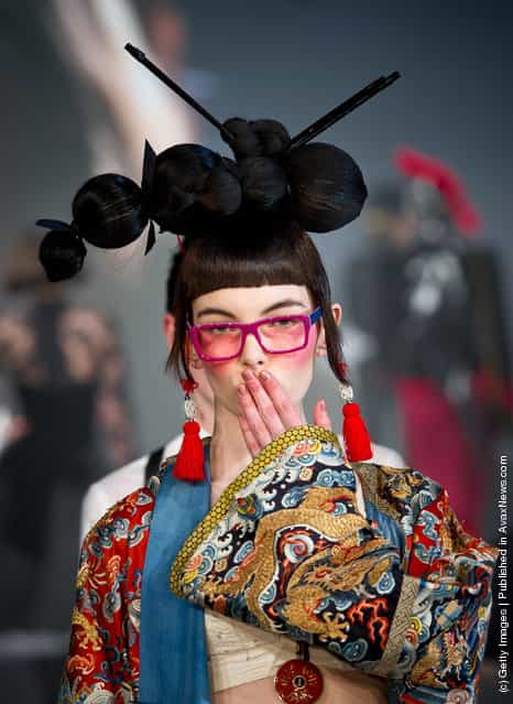 A model walks down the runway during the Safilo fashion show at the Mercedes-Benz Fashion Pavilion
