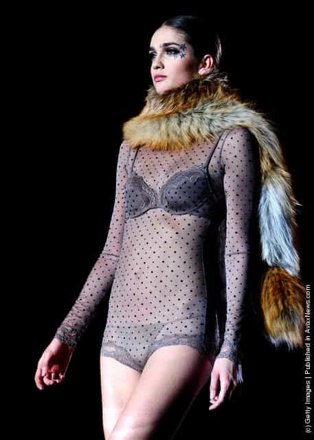 A model walks the runway in the Andres Sarda fashion show during the Mercedes-Benz Fashion Week Madrid Autumn/Winter