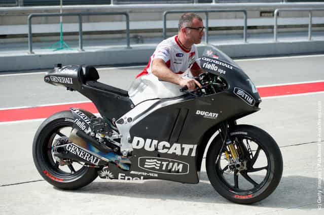 The bike of Nicky Hayden of USA and Ducati Marlboro Team in front of box during the first day of MotoGP testing at Sepang Circuit