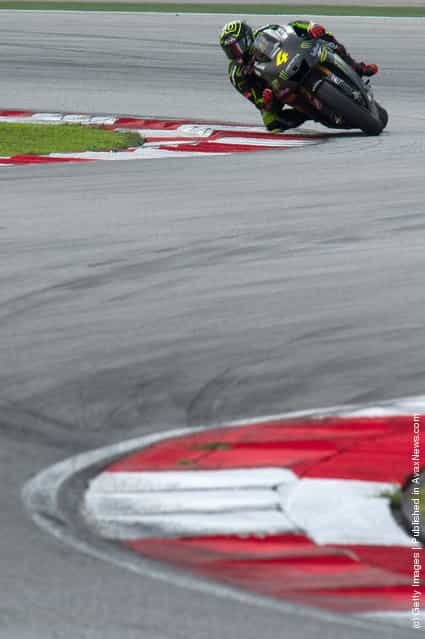 Andrea Dovizioso of Italy and Yamaha Tech 3 rounds the bend during the third day of MotoGP testing at Sepang Circuit