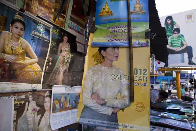  2012 calendar showing Aung San Suu Kyi is for sale along the city streets in Yangon, Myanmar