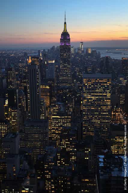 The Empire State Building towers over the Manhattan skyline