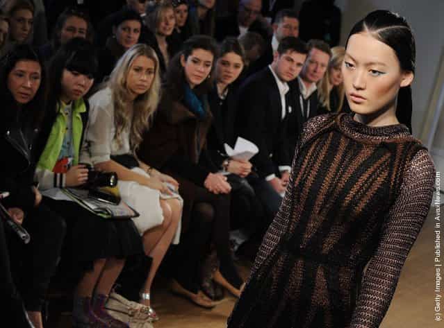 A model walks the runway during the Craig Lawrence show at London Fashion Week Autumn/Winter 2012