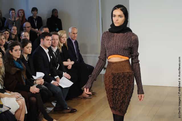 A model walks the runway during the Craig Lawrence show at London Fashion Week Autumn/Winter 2012