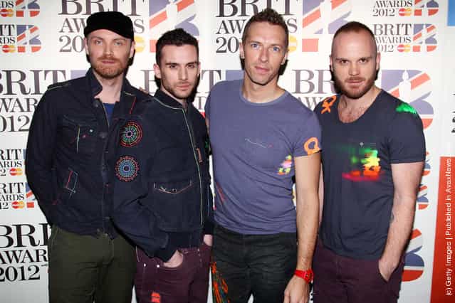 L-R Jonny Buckland, Guy Berryman, Chris Martin and Will Champion of Coldplay attend The Brit Awards 2012 at The O2 Arena