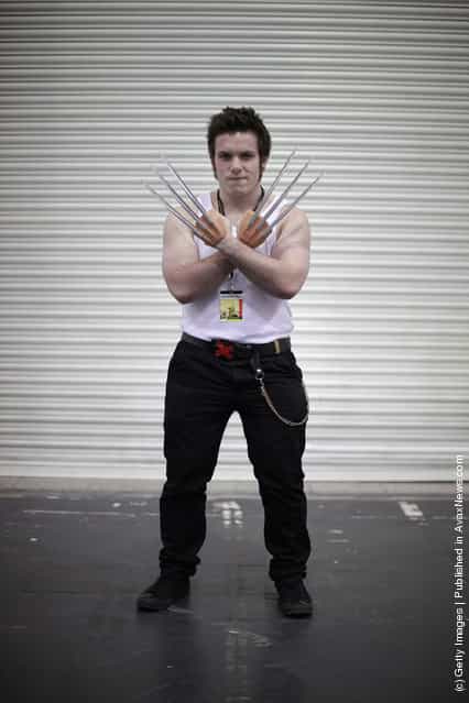 A visitor to the London Super Comic Convention dresses as Wolverine at ExCel