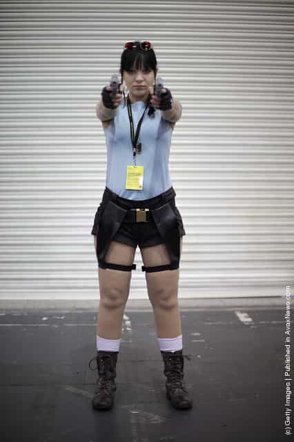 A visitor to the London Super Comic Convention dresses as Lara Croft at ExCel