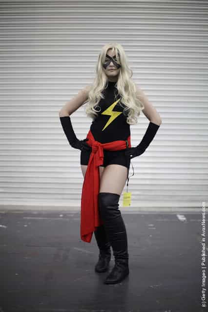 A visitor to the London Super Comic Convention dresses as Ms Marvel at ExCel