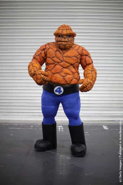 A visitor to the London Super Comic Convention dresses as 'The Thing' at ExCel