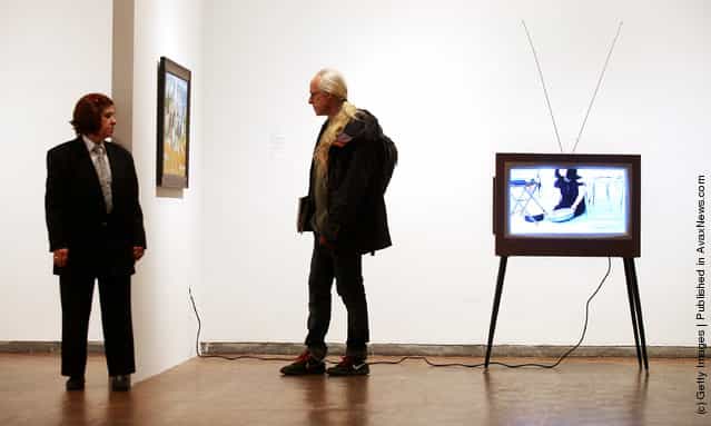 Visitors attend a press preview of the 2012 Whitney Biennial at the Whitney Museum of American Art