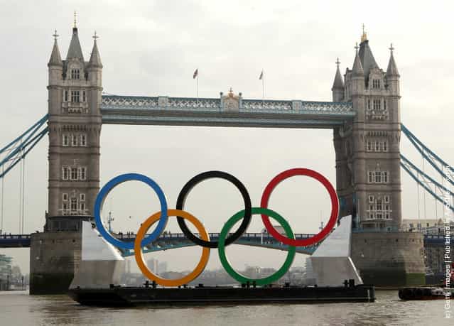 Giant Olympic Rings Are Launched On The River Thames