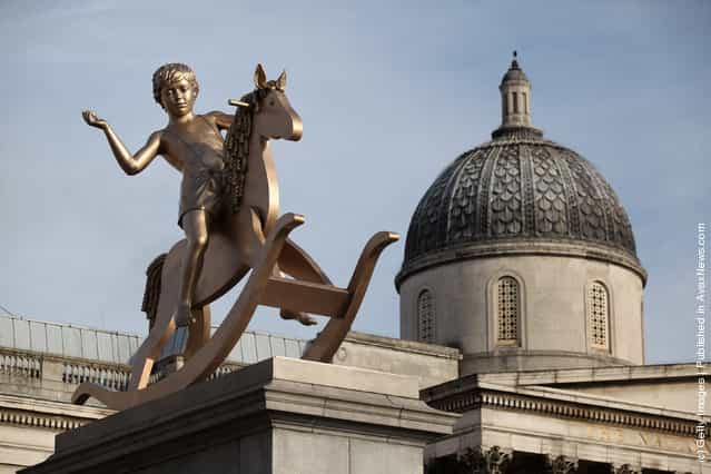 A sculpture entitled Powerless Structures, Fig.101 designed by Danish artist Michael Elmgreen and Norwegian artist Ingar Dragset is unveiled on the Fourth Plinth in Trafalgar Square