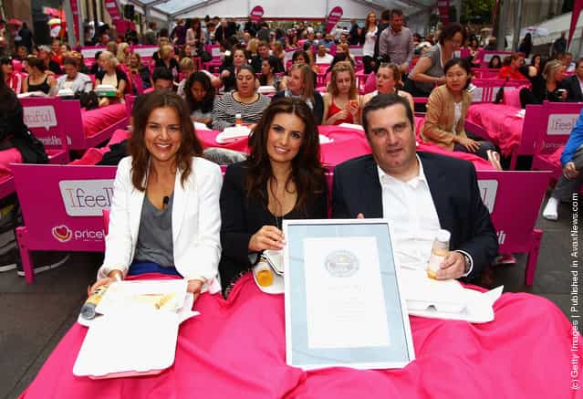 Felicity Harley, Ada Nicodemou and Stephen Roche attend The Worlds Biggest Breakfast in Bed Guinness World Record Attempt at Martin Place in Sydney, Australia