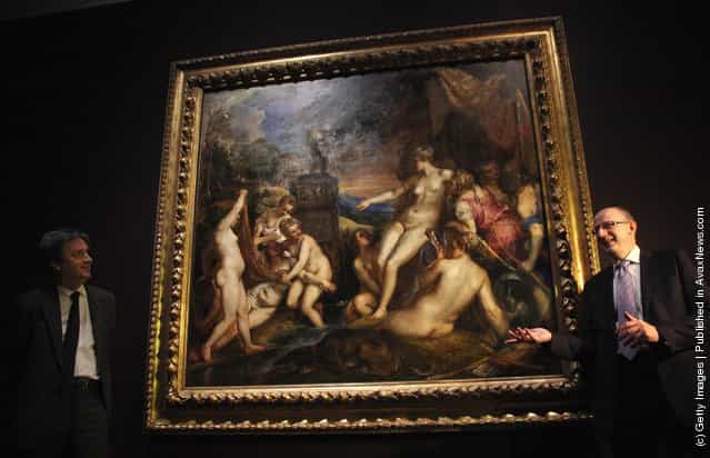 John Leighton, Director General for the National Galleries Scotland (R), and Dr Nicholas Penny, Director of the National Gallery London, stand beside Diana And Callisto (circa 1556-59) oil painting by Venetian artist Titian as it goes on display for the first time at the National Gallery on March 1, 2012 in London