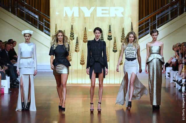 Models Jennifer Hawkins (2nd L) and Jessica Hart (2nd R) showcase designs by Ellery on the catwalk at the Myer A/W 2012 Collection Launch