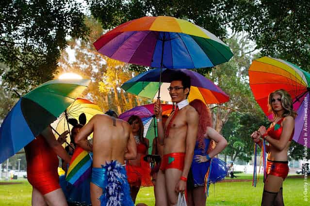 Participants march during the 2012 Sydney Gay & Lesbian Mardi Gras Parade