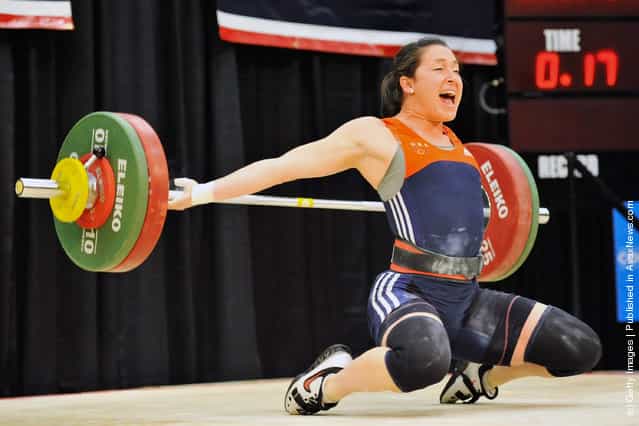 Natalie Burgener drops the bar behind her head while attempting to snatch 98 kilograms during the 2012 U.S. Olympic Team Trials for Womens Weightlifting