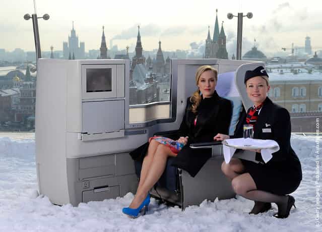 International film actress Gillian Anderson pictured on the rooftop of the Ritz-Carlton Hotel overlooking Red Square in a British Airways Business Class seat to launch the British Airways long haul service on the London – Moscow route