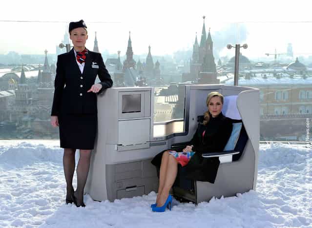 International film actress Gillian Anderson pictured on the rooftop of the Ritz-Carlton Hotel overlooking Red Square in a British Airways Business Class seat to launch the British Airways long haul service on the London – Moscow route