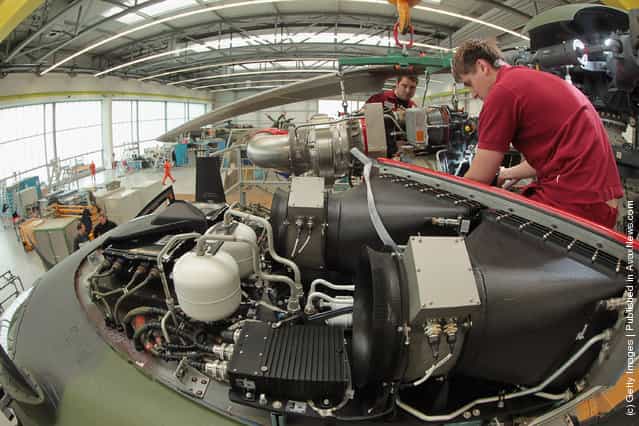 Workers assemble a Eurocopter NH90 military helicopter at the Eurocopter plant
