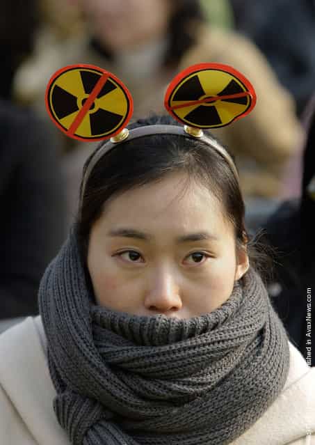 South Korean environmentalists participates in a rally held to commemorate the Fukushima nuclear disaster on the eve of the one year anniversary of Japans earthquake and tsunami