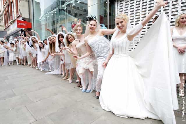 Entertainment One is attempting to set the Guinness World Record for the longest chain of brides in one location at HMV, Oxford Street in London