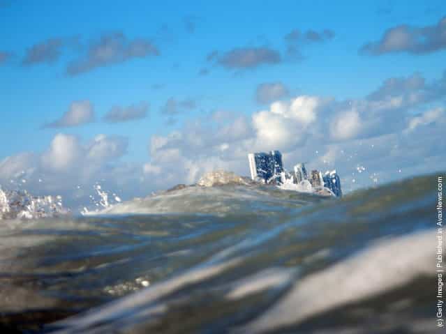 uildings are seen near the ocean as reports indicate that Miami-Dade County in the future could be one of the most susceptible places when it comes to rising water levels due to global warming in North Miami, Florida