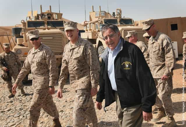 U.S. Secretary of Defense Leon Panetta (R) visits with troops March 14, 2012 at Forward Operating Base Shukvani, Afghanistan