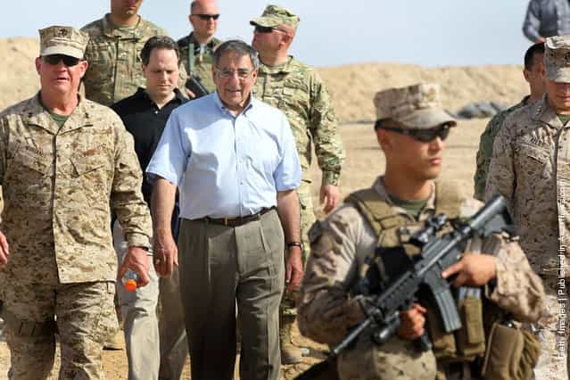 U.S. Secretary of Defense Leon Panetta leaves after visiting with troops from the 31st BN Light Infantry of the Georgian Army March 14, 2012 at Foward Operating Base Shukvani, Afghanistan