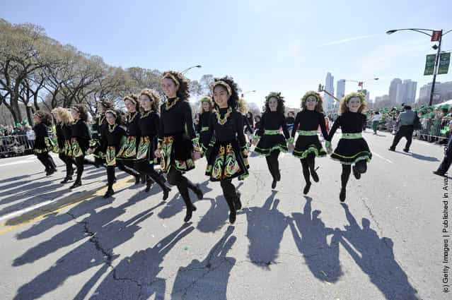 Irish step dancers participate in the St. Patricks Day parade on March 17, 2012 in Chicago, Illinois