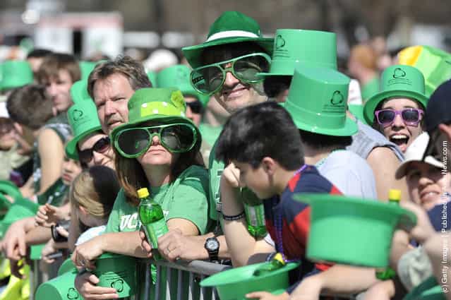 Onlookers watch the St. Patricks Day parade on March 17, 2012 in Chicago, Illinois